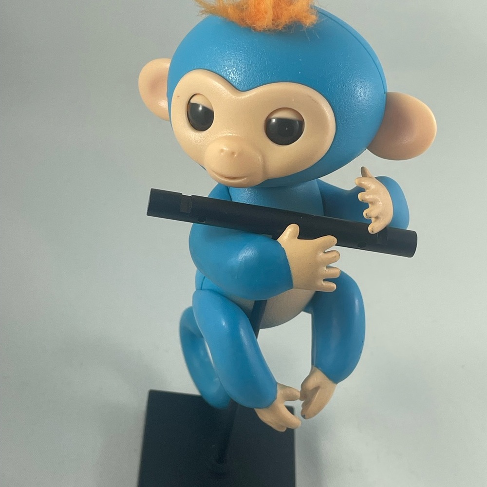Blue Monkey Action Figure with Orange Hair